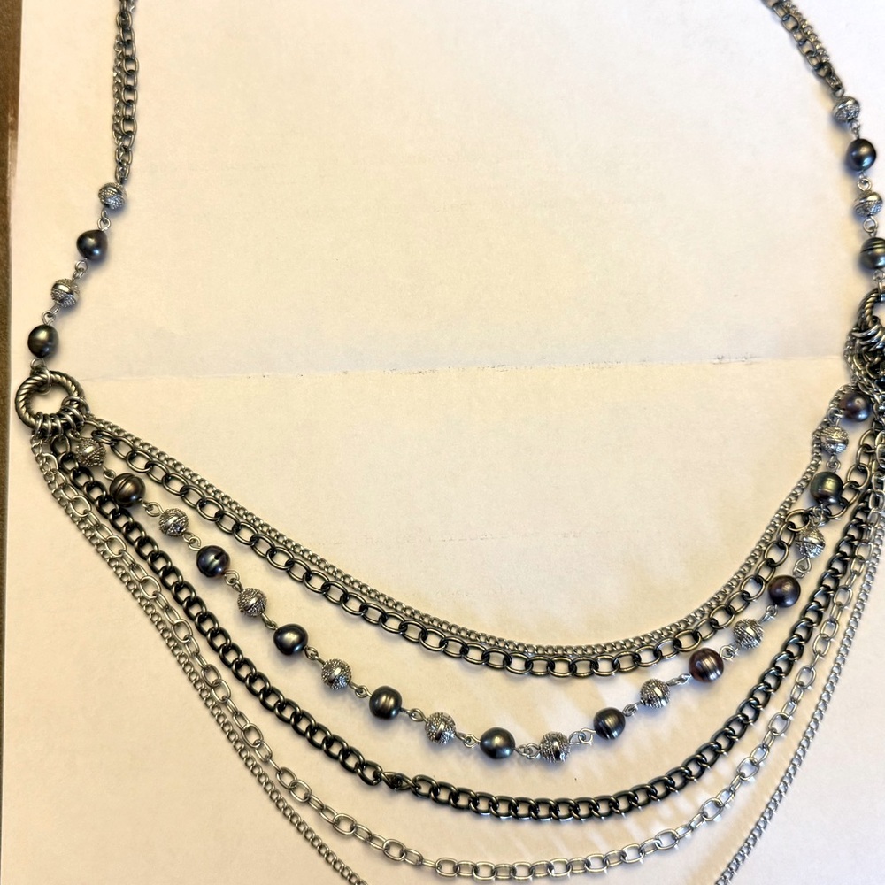 6 strand necklace. Black, grey, and silver.